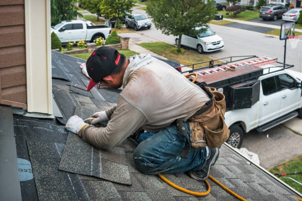 Professional Roofing technician working in Bow, NH